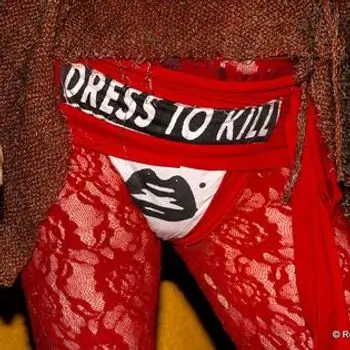 Anita in red underwear with dressed to kill print